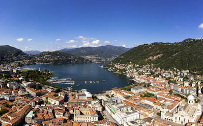 Aerial panorama of the Como old town by lake Como on a sunny summer day in Lombardy, Italy