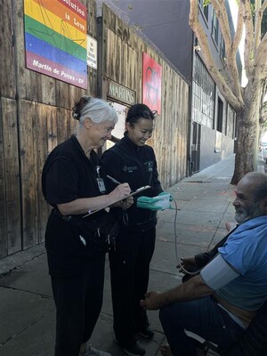 Emily and a provider care for an SOS patient Emily and a provider care for an SOS patient