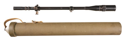 USMC J Unertl 8-power sniper scope with metal screw-in lens caps and scope rings with adjustment knobs, with original storage tube. Optic is slightly speckled, sight picture is clear with a crosshair reticle. This scope was issued to US Marine Corps snipers during World War II and the Korean War, mounted on the legendary M1903A1 Springfield and later Winchester Model 70 sniper rifles. Provenance: Tony Rodriguez collection. Estimate: $2,500-$3,500