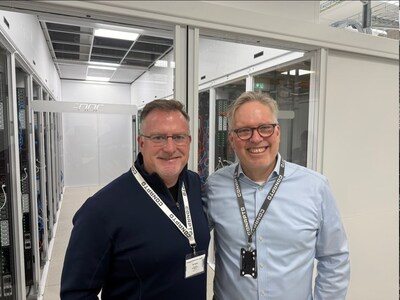 Singularity Compute CEO and Intellistake Advisor Joe Honan[left], pictured with Conapto Senior Sales Manager Nils Boghammar[right] inside the live Singularity Compute NVIDIA GPU cluster datacenter. (CNW Group/Intellistake Technologies Corp.)