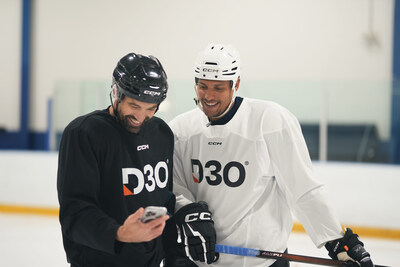 NHL Pro Hockey player Dakota Joshua and How to Hockey's Coach Jeremy, checking out the impact of their D3O phone protection test on the ice at Upper Canada College.