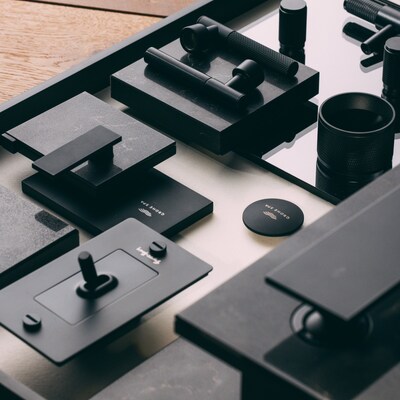 Buster + Punch x GROHE SPA: Integrated collection of fixtures, lighting, and hardware in Phantom Black/Matte Black finishes.