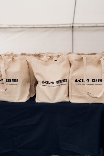 Volunteers from Car Pros, KLAX, and the Los Angeles Regional Food Bank distributed bags of food items and turkey gift certificates to local So Cal families