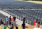 Ribbon cutting moment at DeConna solar project celebration