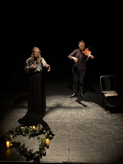 Kristina Libby and Daniel Lee on stage in Holy Sh*t, I Almost Died for This?!