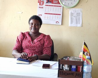 Teacher Joselyn at her desk in Bidong Primary School in Uganda&#8217;s Kiryandongo Refugee Settlement.  &#169; ECW