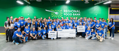 APMEX employees posing with their donation check APMEX employees posing with their donation check