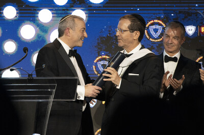 President of Israel, Isaac Herzog, being presented with an honorary doctorate by Rabbi Dr. Ari Berman, president of Yeshiva University, at the university's 101st annual Hannukah Dinner on Dec. 7, 2025.