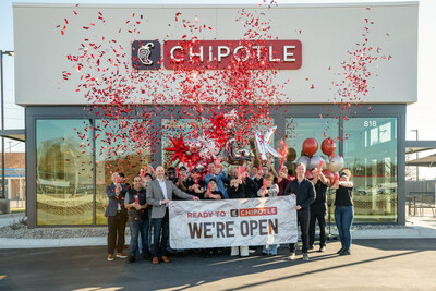 Executives and local team members celebrate Chipotle's 4,000th restaurant opening in Manhattan, Kansas.