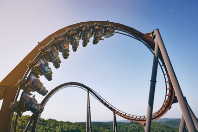 The Wildfire rollercoaster soars over the Ozark Mountains. The Wildfire rollercoaster soars over the Ozark Mountains.