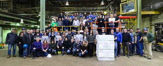 Local 440 members stand in a large crowd inside the Northern Pulp mill on its final day operating in 2020. (CNW Group/Unifor)