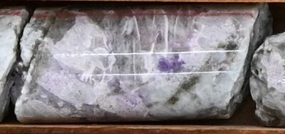 Figure 6: Large crystals of pollucite in drill hole CV25-880 at ~33 m depth (core length) at the CV12 Pegmatite. Core graded 1.5 m at 0.59% Cs2O over sample interval (33.0 m to 34.5 m). (CNW Group/PMET Resources Inc.)