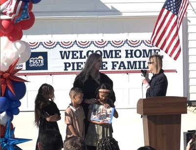 Marine Staff Sergeant Cassandra Pierre and family welcomed to their new home