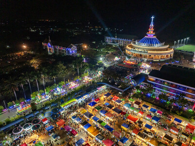 Aerial view of the Sakon Nakhon Christmas Star Parade showing illuminated star processions, festive market stalls, and the Cathedral of St Michael the Archangel during the annual celebration in Tha Rae, Sakon Nakhon. Aerial view of the Sakon Nakhon Christmas Star Parade showing illuminated star processions, festive market stalls, and the Cathedral of St Michael the Archangel during the annual celebration in Tha Rae, Sakon Nakhon.