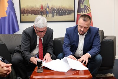 From Left: John Chadbourne, AM General EVP, Business Development and Ejup Maqedonci, Minister of Defense of the Republic of Kosovo finalize the 3-year contract award for HUMVEE 2-CT Hawkeye and other HUMVEE variants, parts, and service support From Left: John Chadbourne, AM General EVP, Business Development and Ejup Maqedonci, Minister of Defense of the Republic of Kosovo finalize the 3-year contract award for HUMVEE 2-CT Hawkeye and other HUMVEE variants, parts, and service support