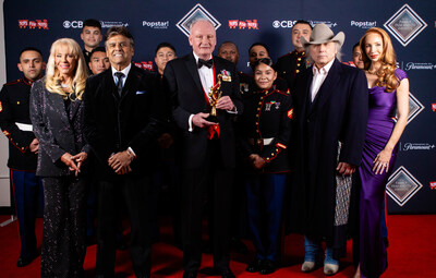 Lieutenant General USMC (Ret) and Marine Toys for Tots Foundation President & CEO James B. Laster pictured with Laura McKenzie, Erik Estrada, Dwight Yoakam, Elizabeth Stanton, and members of the U.S. Marine Corps. at the 28th FAMILY FILM AND TV AWARDS. (Getty Images for Family Film and TV Awards)