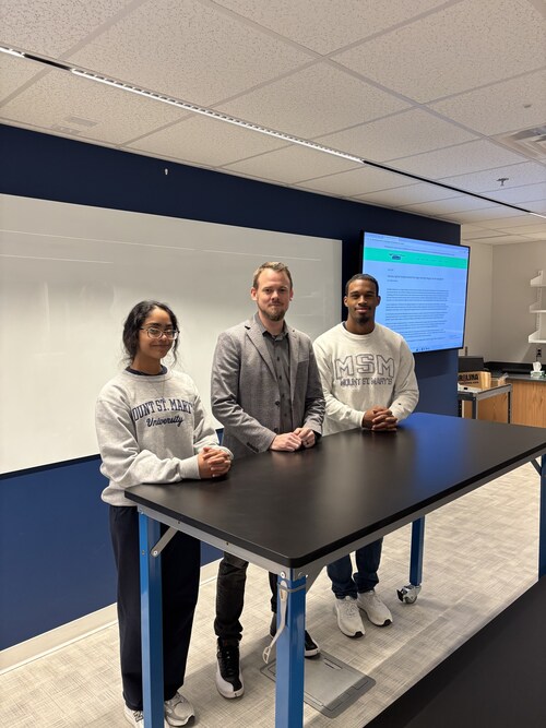 Students Aiden Day and Rashley Rodrigo with Assistant Professor William Christiansen