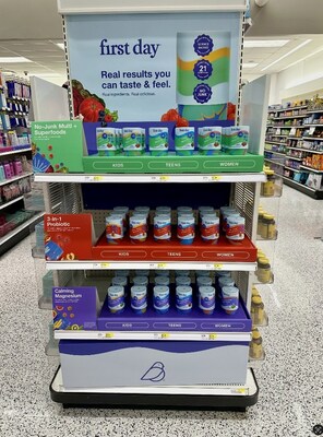 Endcap retail display at Target featuring First Day multivitamin, magnesium and pre+ post probiotic gummy vitamins