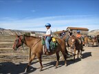 2012: Campers enjoying summer camp while horseback riding. 