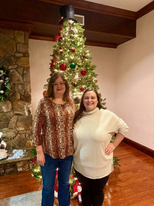 Kenross II Board President, Judie Wishart, and AMG Community Manager, Elaina Carroll, attend the board annual meeting.