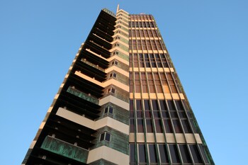 Photo of the exterior of the Price Tower, designed by Frank Lloyd Wright, photo by John H. Waters, AIA