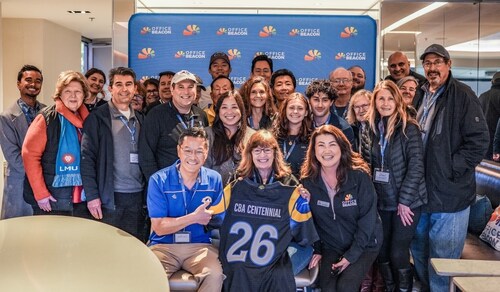 LMU President Thomas Poon and LMU CBA Dean Dayle Smith celebrate CBA’s 100th anniversary with LMU and Office Beacon teams at SoFi Stadium.