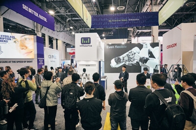 Photo credit: WIRobotics. Visitors gather at the WIRobotics booth to watch a live demonstration of the humanoid robot ALLEX.
