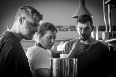 Culinary R&D Session: Chef Eitan Eliraz (left) collaborating with the late legendary Pastry Chef Miri Sternberg and photographer Asaf Karla to refine the structural integrity of plant-based fine dining. (Photo: Asaf Karela, Karela Agency)