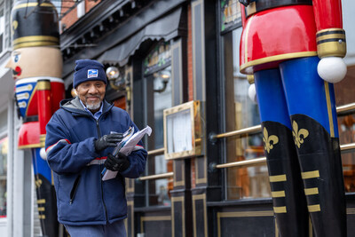 U.S. Postal Service carrier delivers mail during holidays in Washington, D.C.