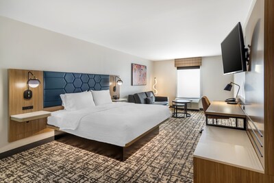 Newly renovated guest room at Hampton Inn Atlanta–Stockbridge featuring modern comfort and design.