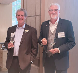Bill Wolf and John Foster toasting Wolf & Associates 30th anniversary of serving the organic industry at OTA's Organic Week event in Wash. DC (August 2025)