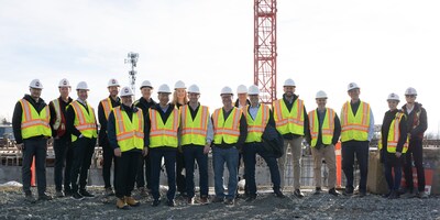 A group photo at the construction site of the future Delta intelligent Building Technologies Headquarters in Surrey, BC Canada including; Delta President & CEO, John Nicholls (5th from left), Delta Electronics General Manager of Building Automation, Hong Wu (7th from left) and Loytec CEO Hans-Jörg Schweinzer (6th from right) joined by others from Delta Intelligent Building Technologies C-Suite & Management Team, Loytec Management and local BC construction partner Wales McLelland. A group photo at the construction site of the future Delta intelligent Building Technologies Headquarters in Surrey, BC Canada including; Delta President & CEO, John Nicholls (5th from left), Delta Electronics General Manager of Building Automation, Hong Wu (7th from left) and Loytec CEO Hans-Jörg Schweinzer (6th from right) joined by others from Delta Intelligent Building Technologies C-Suite & Management Team, Loytec Management and local BC construction partner Wales McLelland.