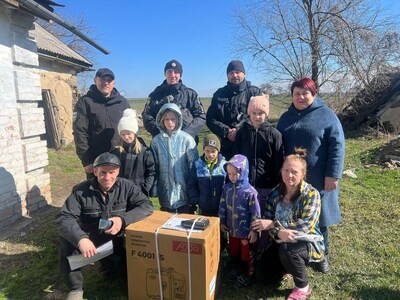 Ukrainian Family with their Generator.