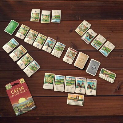 In CATAN – On the Road, players are working to reach seven victory points first, using many familiar mechanics from CATAN with a little twist: Collecting resources by drawing cards, building from a shared pool of available options, and trading with either the bank or each other. Trade is incentivized even more in this game: The player who is not actively taking their turn gets to draw a bonus resource card for participating in a trade.
