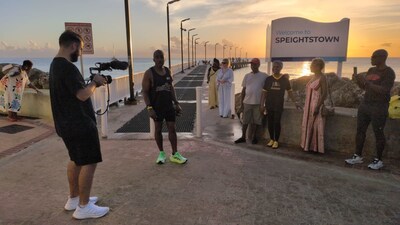 Rey by Speightstown Jetty addressing supporters before setting of to run over 100km around Barbados