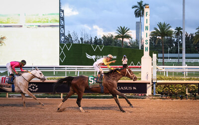 Skippylongstocking and Jockey Tyler Gaffalione cross the finish line to win the $3 million Pegasus World Cup Invitational (GI)