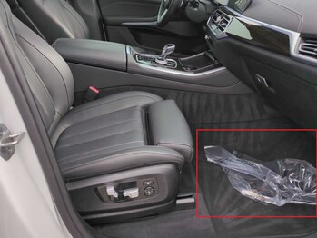 Example of issue with vehicle image flagged by Xcite’s Automated Compliance tool - object in vehicle