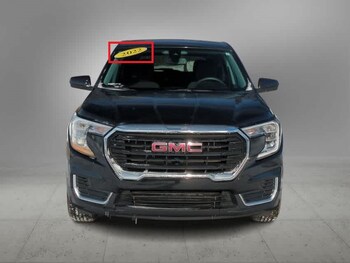 Example of issue with vehicle image flagged by Xcite’s Automated Compliance tool - sticker on window