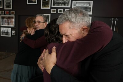 Until this moment, neither family knew how deeply their histories were intertwined. (Jason DeCrow/AP Content Services for Ancestry)