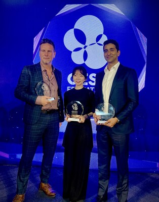 Pictured is Ahrum Choi (center), Director of Dot Inc., holding the 