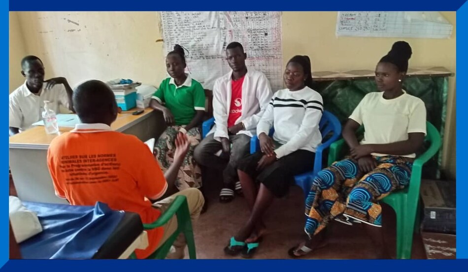 Project staff conducting a violence awareness session with women at Kumuru Health Facility in the Democratic Republic of the Congo