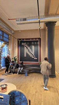 At around 100 sq. ft and 42,000 flaps, Oat Foundry's custom-branded Split Flap board can accommodate over 1,500 characters. The display's modular design allows it to be scaled for a range of spaces, including Nespresso's luxury coffee expansive shop layout.