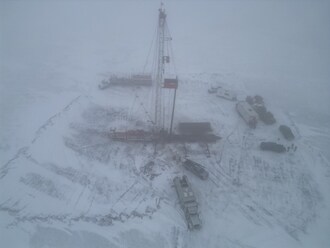 Figure 1 - Service Rig (CNW Group/EMP Metals Corp.)