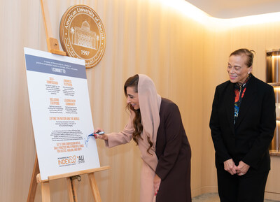  Her Highness Sheikha Bodour bint Sultan Al Qasimi signing the Ali Compassion Pledge with Lonnie Ali (Photos Courtesy of Muhammad Ali Center and the American University of Sharjah)