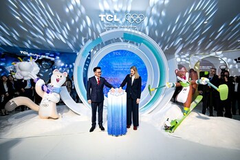 Kevin Wang, CEO, TCL Technology and Kirsty Coventry, President of the International Olympic Committee celebrate the opening of TCL Edelweiss Land