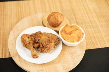 The 2-piece Southern Kitchen Fried Chicken with side item (your choice) and bread.