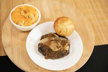 Chargrilled chopped steak with side item (your choice) and bread.