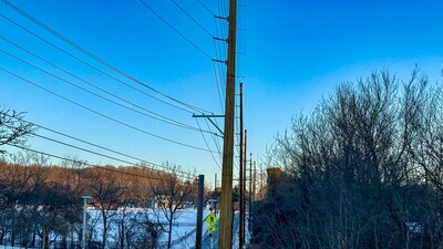 Newly installed utility poles along Roberts Rd. in Holmdel, NJ are helping upgrade service for JCP&L customers in Monmouth County.