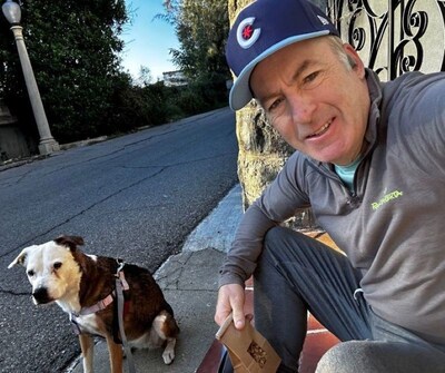Actor Bob Odenkirk reviews Petco Love Stories Finalists and celebrates the lifechanging impact of pet adoption, pictured here with his adopted and loved dog, Olive.