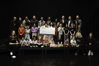 Genesis Inspiration Foundation board members and staff, Genesis Motor America employees, and Positively Arts team and students gather for a check presentation at Positively Arts in Las Vegas on Feb. 4, 2026. (Photo/Genesis)